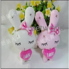 Take drill tie rabbit  doll embrace heart rabbit love rabbit rabbit eyes narrowed  cartoon bouquet doll 