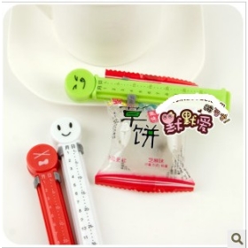 Cartoon smiling face with date sealing clamp/seal clamp food clip 