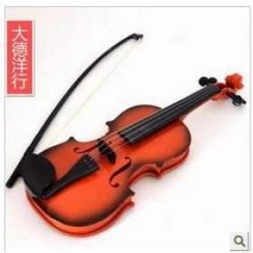 The children to the first  instruments the violin music children toy violin  