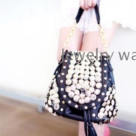 free shipping Summer new women's bag bucket button shoulder oblique cross diamond chain fashion tassel portable      